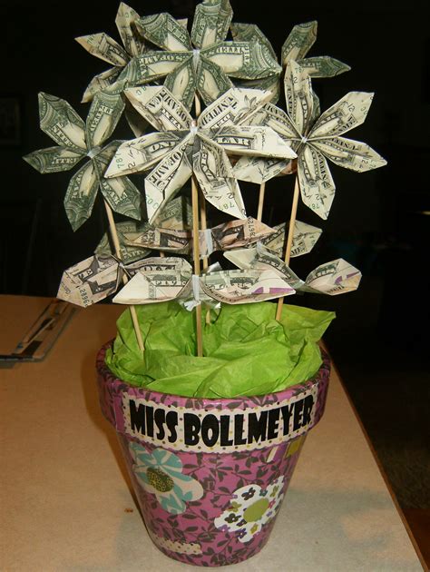 How do you fold money into flowers. Things To Know About How do you fold money into flowers. 
